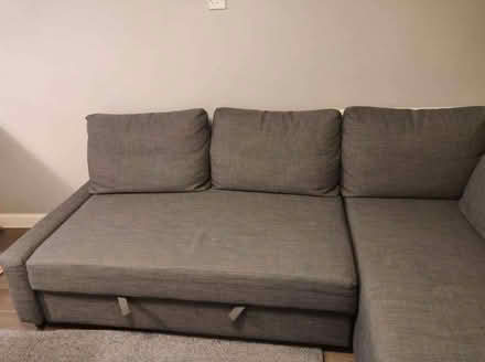 Photo of free IKEA L shaped brown sofa with pull out bed + ottoman storage (West Brompton SW10) #1