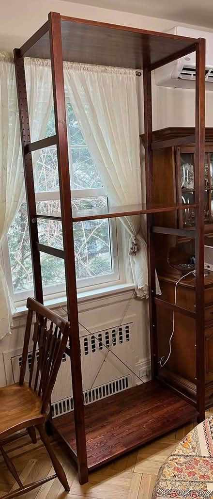 Photo of free Dark wood shelving unit (Great Neck) #1