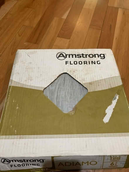 Photo of free Grey peel and stick flooring (Mahtomedi) #1