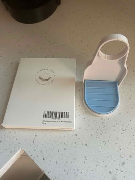 Photo of free Laundry Detergent Cup Holder (White plains) #2