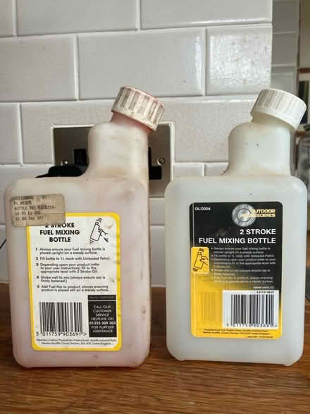Photo of free 2 stroke fuel mixing bottle x2 (Dore S17) #1