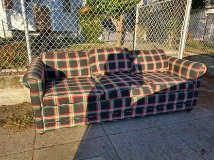 Photo of free Pull out couch (46th and Market st. Oakland) #1