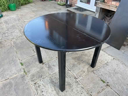 Photo of free Black wooden dining table (Woodley RG6) #2