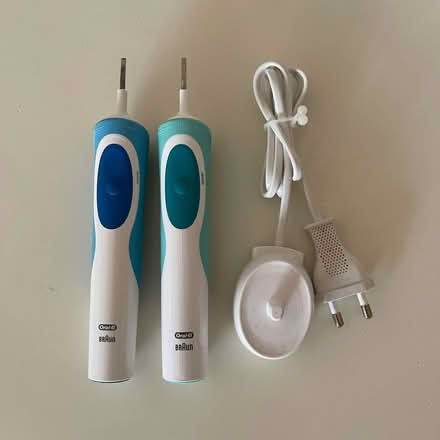 Photo of free Two Oral B toothbrush handles and a charger (Newbury RG14) #1