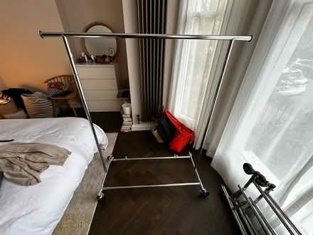 Photo of free Metal hanging rail with wheels (Archway N19) #1