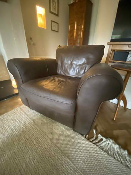 Photo of free Leather armchair and footstool (Kirkby-in-Furness) #1