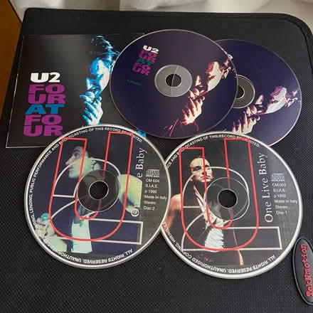 Photo of free U2 CDs (North Beacon Hill) #1