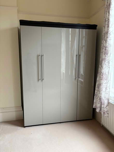 Photo of free Triple light grey gloss wardrobe with large silver handles (Eastbourne BN20) #1
