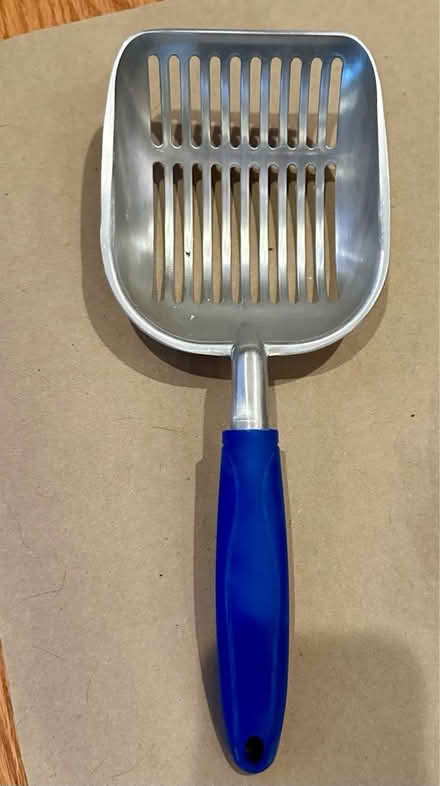 Photo of free Metal slotted feed scoop (Falls Church City) #1