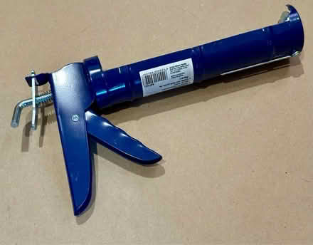 Photo of free Caulk gun (1)—new condition (Falls Church City) #1