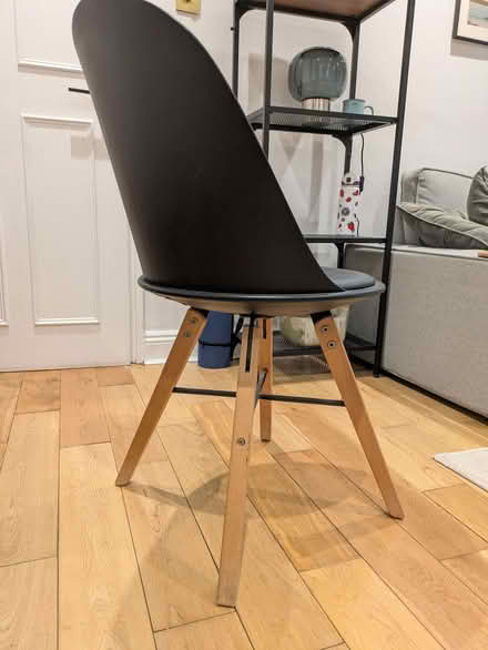 Photo of free 2 black dining chairs with wooden legs (Barnsbury N1) #2