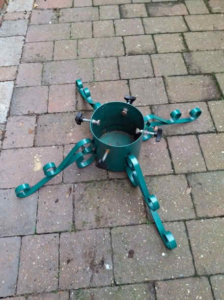 Photo of free Christmas tree stand (Knotty Green HP9) #1