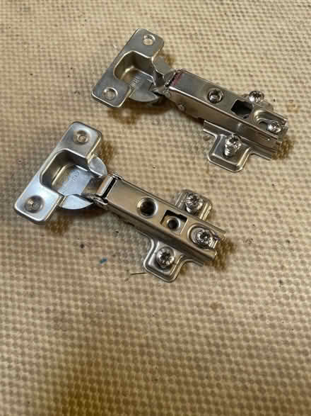 Photo of free Pair of standard overlay cabinet hinges (Waterbeach CB25) #1