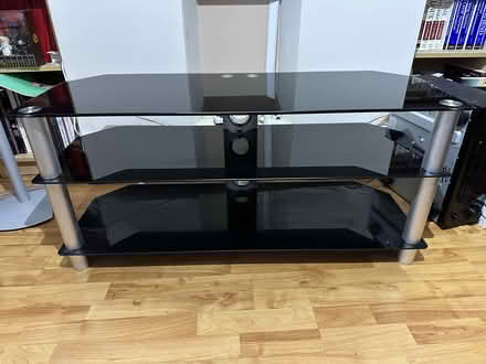 Photo of free TV Stand - Black Glass with Silver (gu12 5PD) #1
