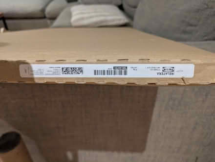 Photo of free IKEA RELATERA desk/table top, brand new 117x60cm (Brockley SE14) #2