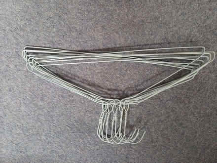 Photo of free Bundle of 10 wire coat hangers (Fleetville AL1) #1