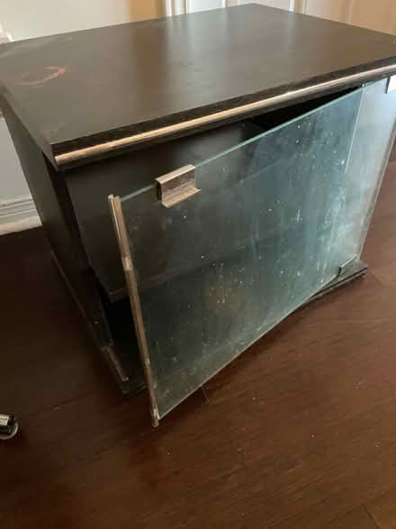 Photo of free Small tv stand with glass door (Mavis and Eglinton) #1
