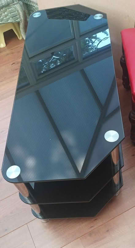 Photo of free Large Dark glass TV unit (Bury St Edmunds, IP33) #3