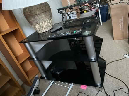 Photo of free Black and metal TV stand (SW11) #1