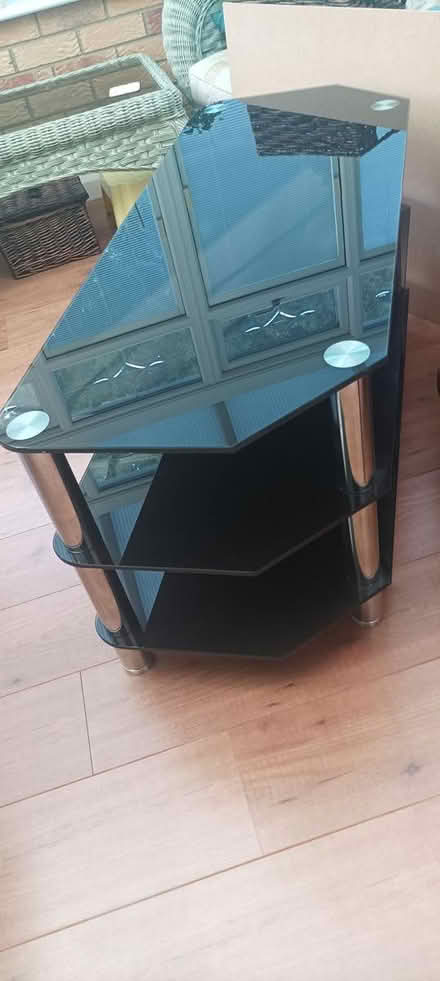 Photo of free Large Dark glass TV unit (Bury St Edmunds, IP33) #2
