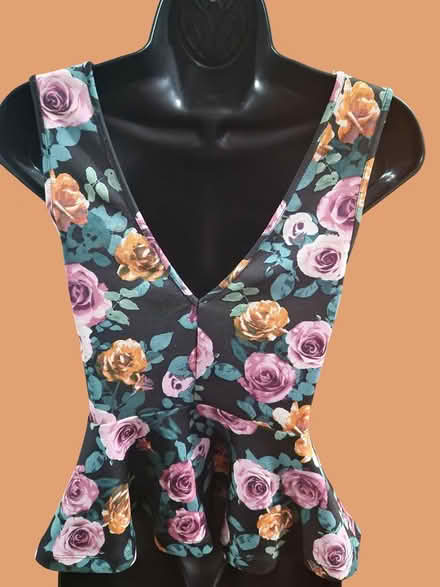 Photo of free Rosy Peplum Top (University Heights) #2