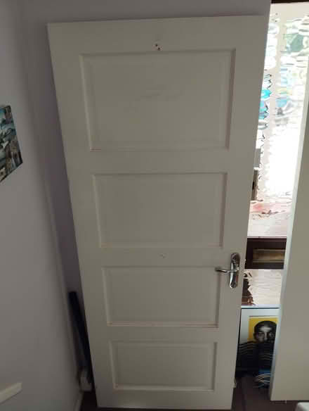 Photo of free 4 panel solid Pine internal door (Shepperton TW17) #1