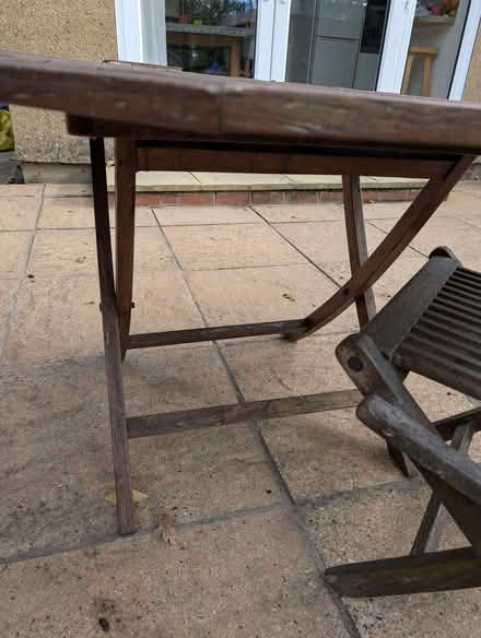 Photo of free Solid teak outdoor table and chair (note needs repair) (Kidlington OX5) #3