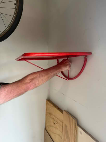 Photo of free Folding metal shelf (Del Ray near GW Middle School) #1