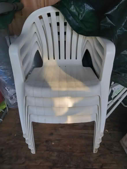 Photo of free 4 Hard Plastic Stack Garden Chairs (Dorking (near Cock Roundabout)) #1