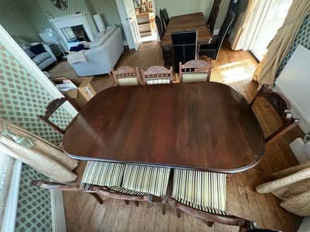 Photo of free Dining table with 8 chairs (CM3 East Hanningfield.) #1