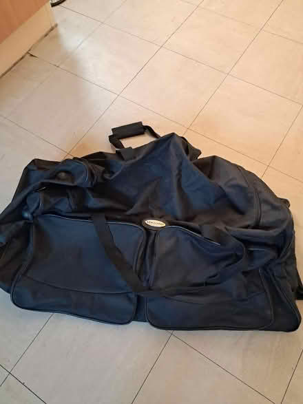 Photo of free Large black luggage holdall (Belper DE56) #1