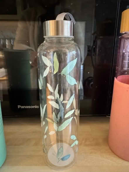 Photo of free Glass drinking bottle - leaf pattern (Gleneagles area, Wboro NN8) #1