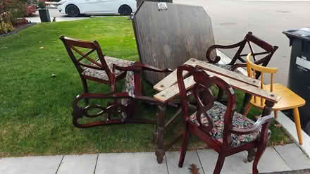 Photo of free CURB ALERT dining table and chairs (2808 Tradewind Dr., Miss.) #3