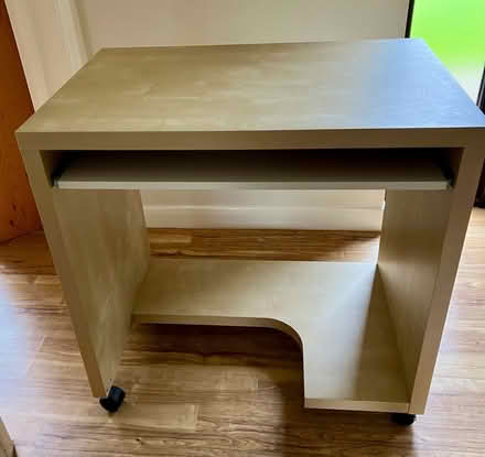 Photo of free Free standing desk with pull out keyboard shelf (Knotty Green HP9) #1