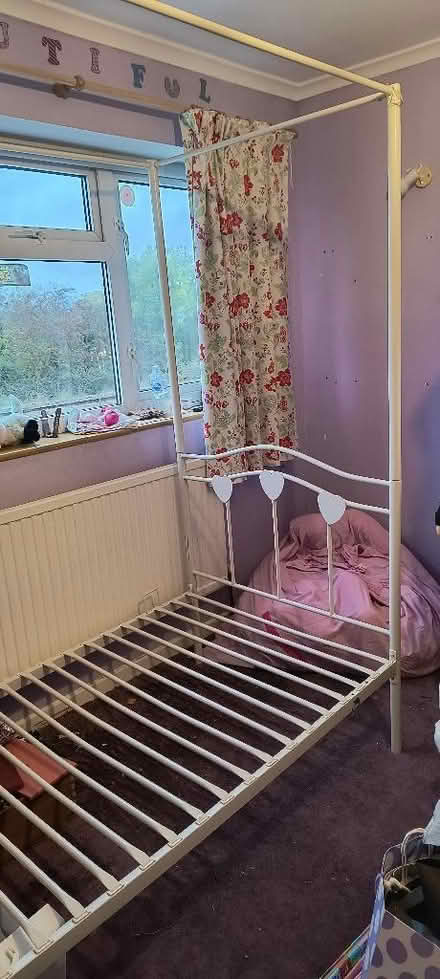 Photo of free Single 'four poster' metal bed frame - could do with a weld (Malvern Link WR14) #1