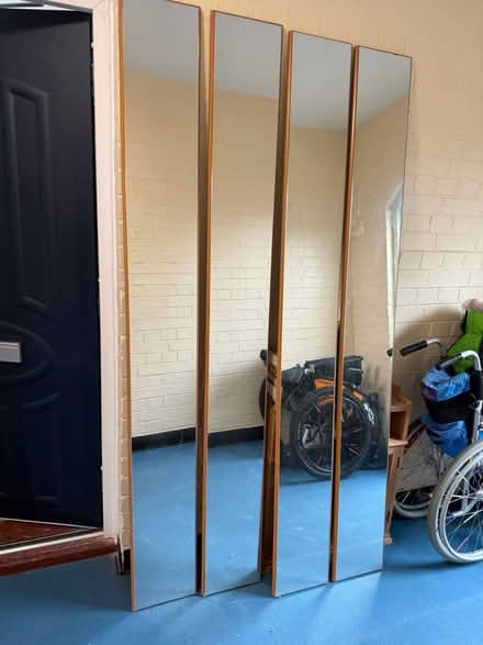 Photo of free 4 long mirrors mounted on wood (Carshalton SM5) #1