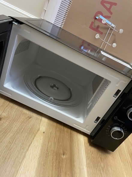 Photo of free 1 black microwave (Earls Court SW5) #2