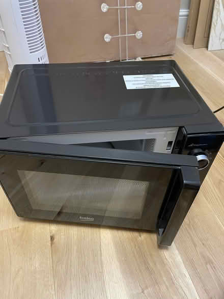 Photo of free 1 black microwave (Earls Court SW5) #1