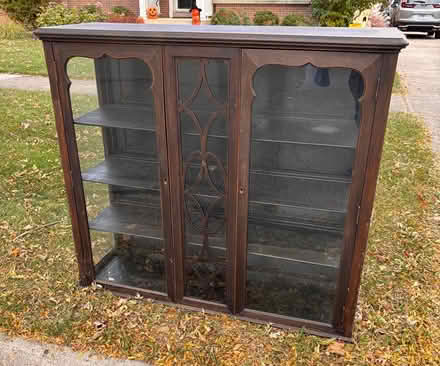 Photo of free Glass Door Curio Cabinet (200 Block North Elmhurst Ave) #1