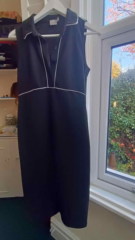 Photo of free 2 dresses size 12. 4 sports bra (White City, W12) #3