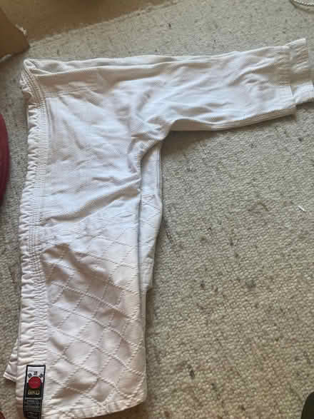 Photo of free Child’s judo top (used & orange belt) near Brighton station (West Hill BN1) #1
