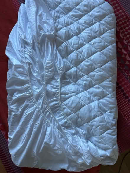 Photo of free New 3/4 mattress protector (Gleneagles area, Wboro NN8) #1