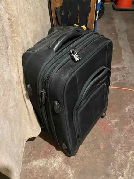 Photo of free Suitcase (69th Ave btw 60th Ln & 60th st) #1