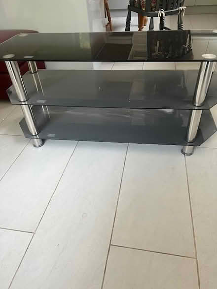 Photo of free glass tv stand as new (Lindford GU35) #1