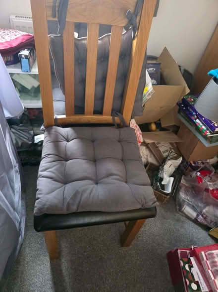 Photo of free 2 oak dining chairs with black padded seats (Telford and Wrekin TF4) #1