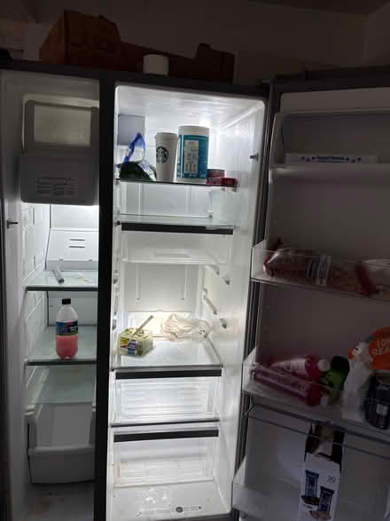 Photo of free 22 Cubic foot side-by-side fridge (Security Boulevard and 70) #1