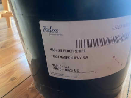 Photo of free Forbo linoleum flooring adhesive (Vashon Cohousing, Bank Rd) #1