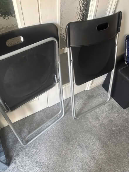 Photo of free 2 Ikea black plastic fold up chairs (Spalding PE11) #2