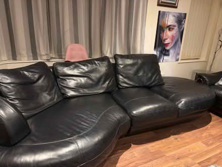 Photo of free Black leather sofa (Denton Road, Manchester) #1