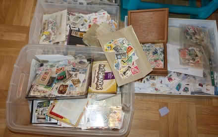 Photo of free Five containers of collectable postage stamps, on/off paper (Kingsway) #3